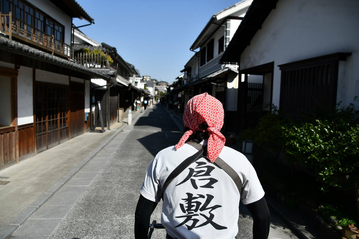 人力車に揺られながら堪能する美観地区の町並みと俥夫さんの背中の写真 その8