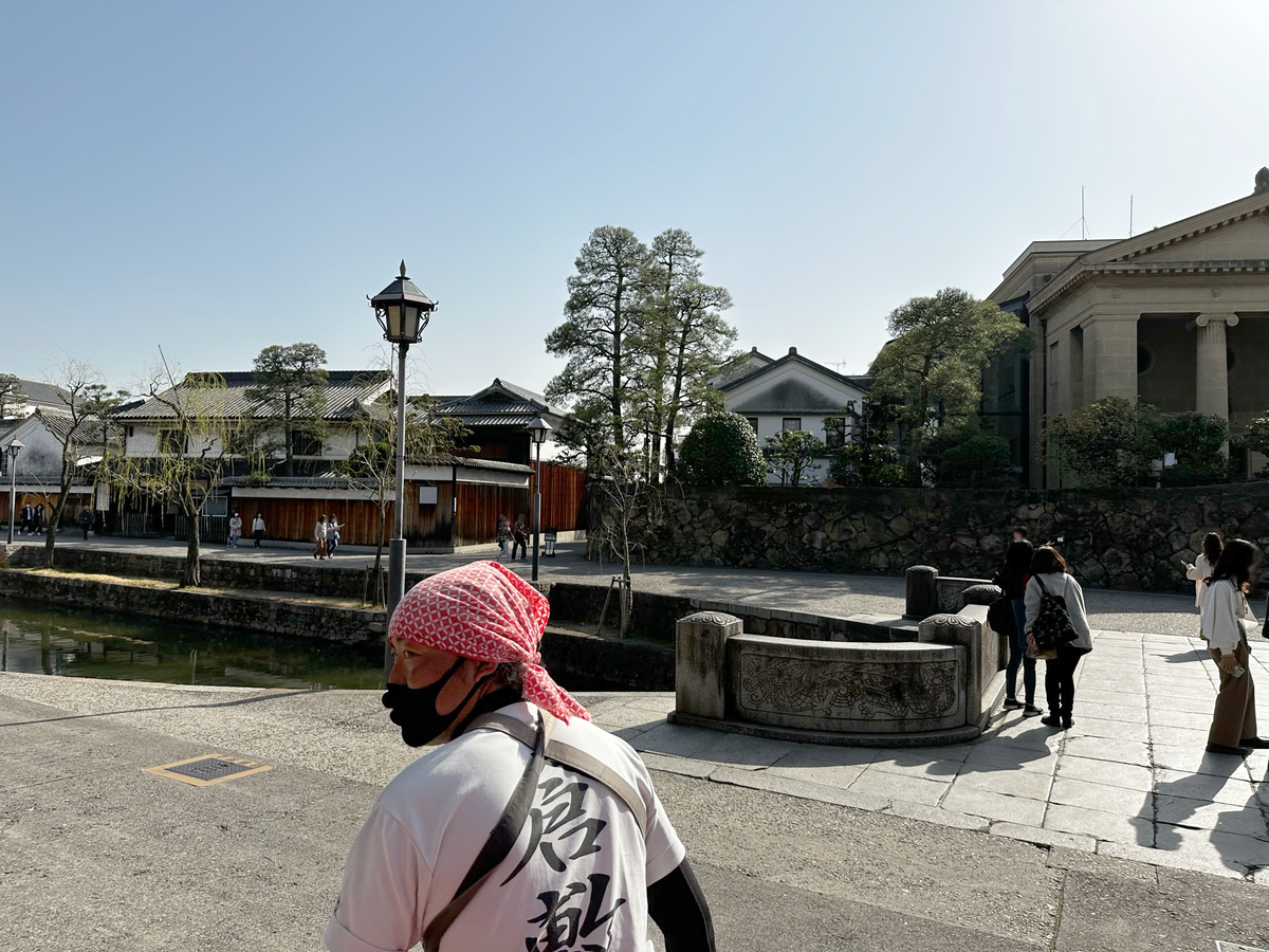 人力車に揺られながら堪能する美観地区の町並みと俥夫さんの背中の写真 その10